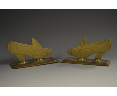 Trench Art - a pair of early 20th century brass commemorative models, of shoes, each inscribed A Present from Pembroke Dock, 