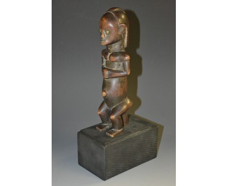 Please note amended catalogue descriptionTribal Art - a Fang reliquary figure, seated, applied brass eyes, 20.5cm high, Gabon