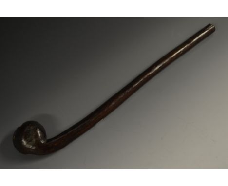 Tribal Art - an African hardwood club or throwing weapon, the ridged head card with a stylised face, 51cm long, 19th/early 20