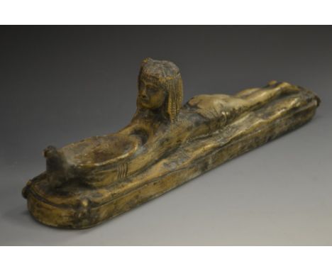 A museum type plaster model, after the Ancient Egyptian, of an outstretched female deity grasping a vessel, 34.5cm long