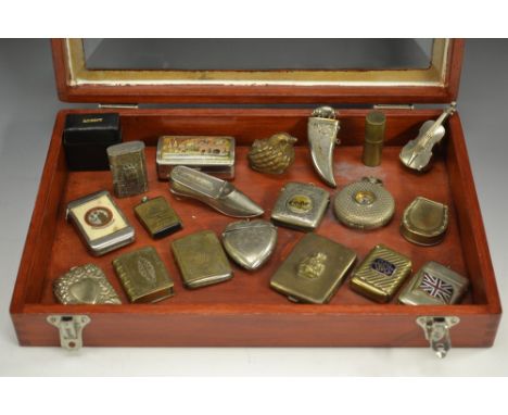 A late 19th century EP on brass novelty vesta case, as a shoe, push-button hinged cover with strike, 8cm long, c. 1880; a Vic