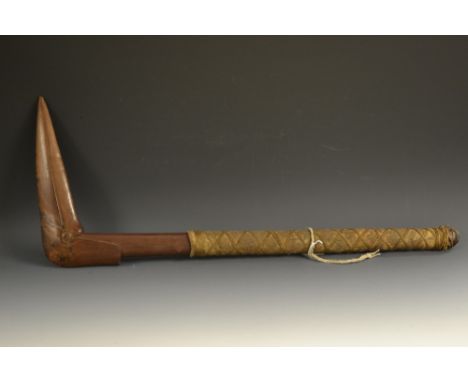 Tribal Art - a Polynesian hardwood bird head club, of typical form, fibre bound shaft, 74cm long, Kanak people, New Caledonia