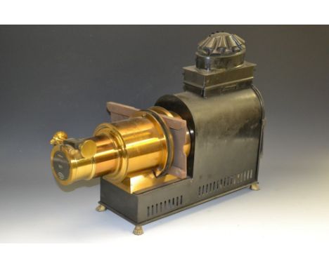 A late Victorian lacquered brass and black painted magic lantern, fluted chimney, Rd. No. 519324, 49cm long, c.1890 (converte