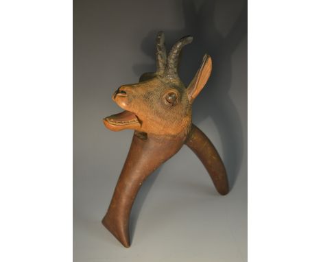 An early 20th century Black Forest nutcracker, carved  with the head of an Alpine Ibex,  21cm high, c.1900