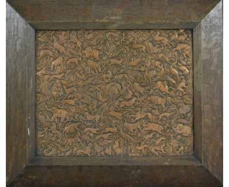 A 19th century Indian copper panel, embossed overall with fish, elephants, cattle, monkeys, cattle, birds and insects, 30cm x