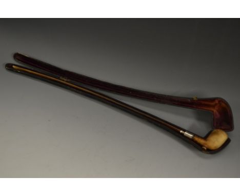 A 19th century church warden pipe, Meerschaum bowl, horn stem, silver-coloured metal ferule, 42cm long, cased en suite, c.188
