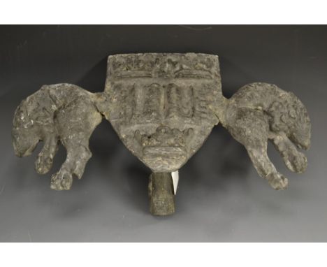 A 19th century architectural lead armorial, cast as the coat of arms of the University of Oxford, supported by beasts, 38cm w