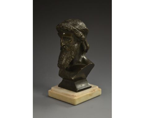 Grand Tour School (19th century), a dark patinated bronze bust, of a man from Antiquity, square alabaster base, 12cm high   C