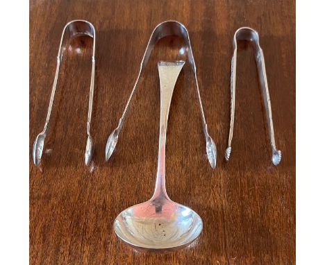 THREE SILVER SUGAR TONGS AND PLATED LADLE