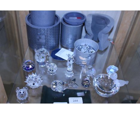 A shelf full of mainly Swarovski crystal A/f 