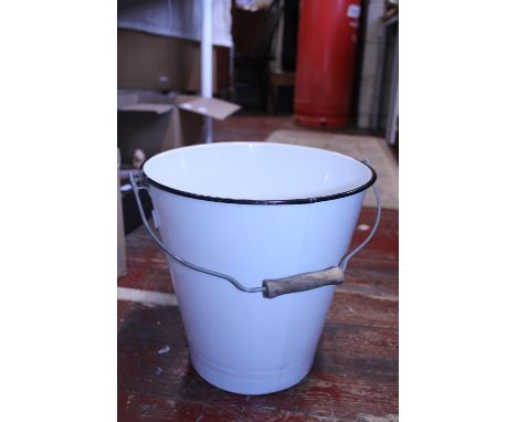 A vintage enamel bucket 