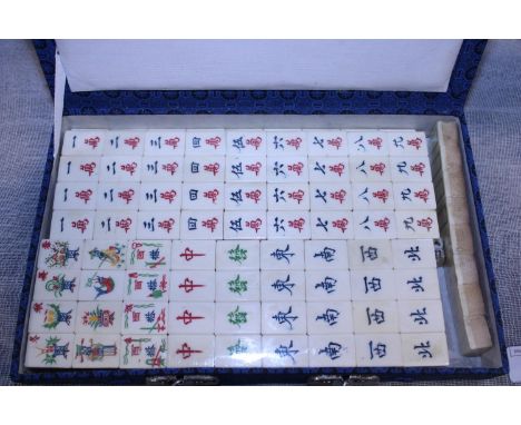 A boxed and sealed Mahjong set 