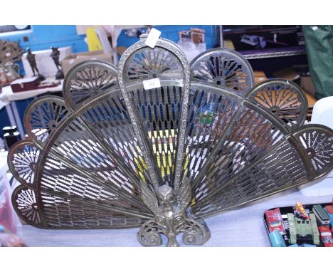 A vintage brass peacock firescreen, shipping unavailable 