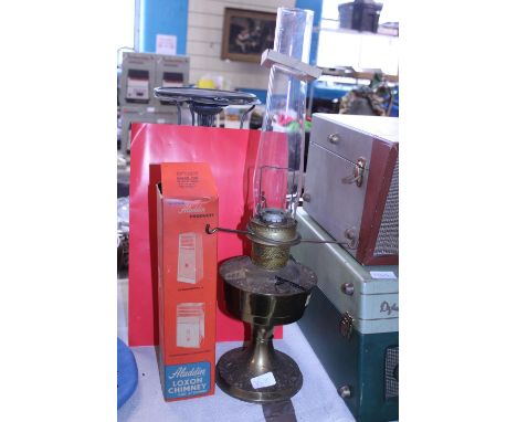 A vintage brass oil lamp 