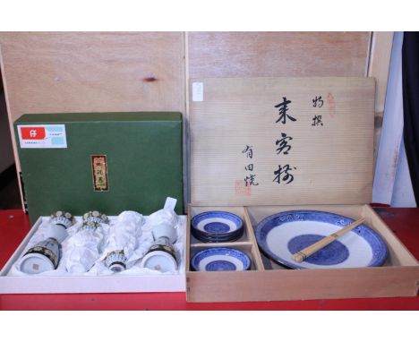 A boxed Japanese Saki set and a oriental ceramic set 