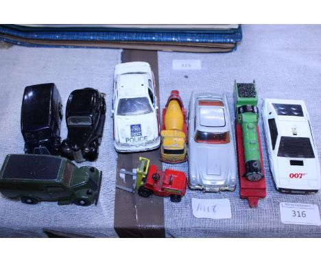 A selection of playworn die-cast models including Corgi &amp; Dinky 