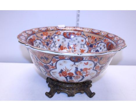 A large ceramic late 19th century bowl on a heavy brass stand d44cm, shipping unavailable 