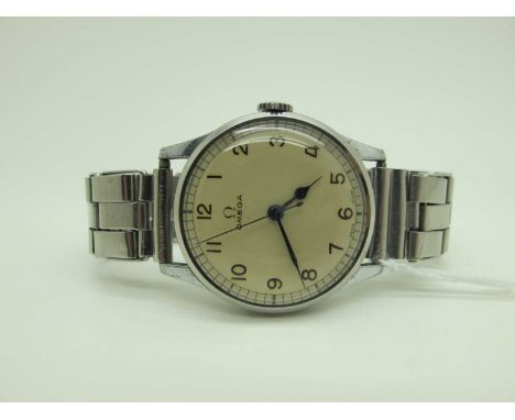 Omega; A Vintage Gent's Wristwatch, the signed dial with Arabic numerals and centre seconds, the movement stamped "Omega Swis