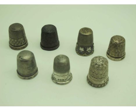 Hallmarked Silver and Other Thimbles, including enamel highlighted (damage) (holes). (7) [696420]