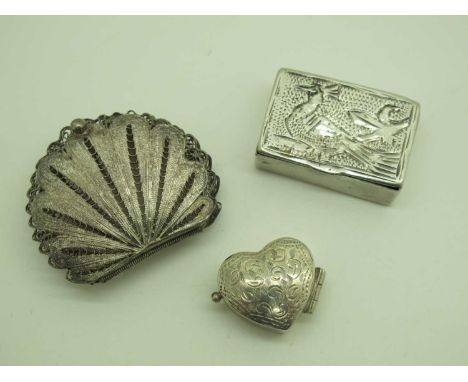A Small Modern Heart Shape Pill Box, stamped "925"; together with a rectangular pill box and a filigree shell shape trinket h