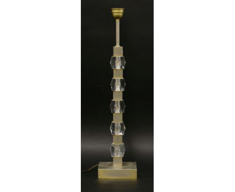 A facet cut Lucite and gilt metal table lamp base,probably by Adnet,54cm