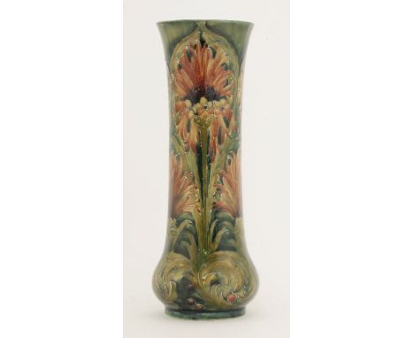 A William Moorcroft Macintyre 'Revived Cornflower' pattern vase,the swollen base with a tall cylindrical neck and a flared ri