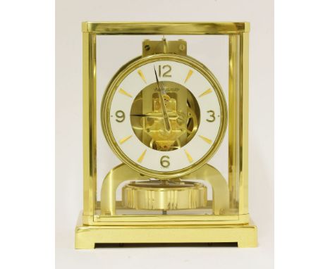 A Jaeger-LeCoultre gilt brass 'Atmos' clock,c.1967, Caliber 526-5, in original case, with paperwork and guarantee,22cm high