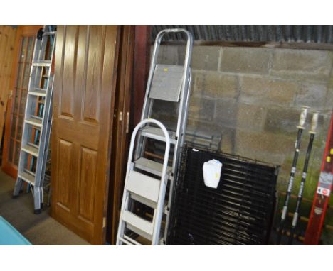An aluminium step ladder and a set of steps