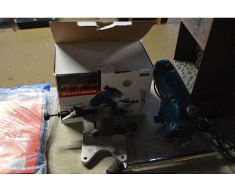 A chainsaw sharpener 