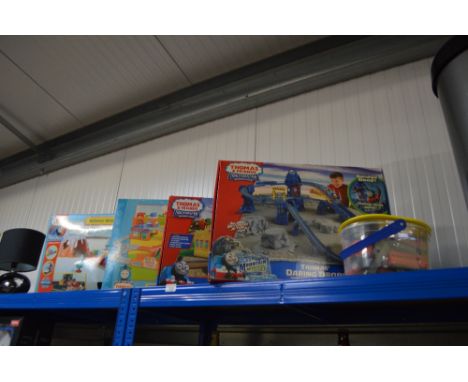 Four Thomas The Tank Engine train sets; together with a box of various trains