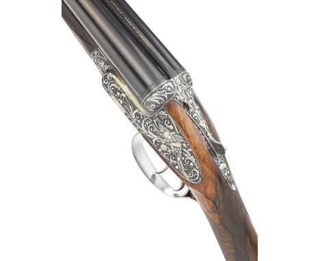 A fine chiselled and relief-engraved 12-bore self-opening sidelock ejector gun by J.Purdey &amp; Sons, no. 19233, engraved by