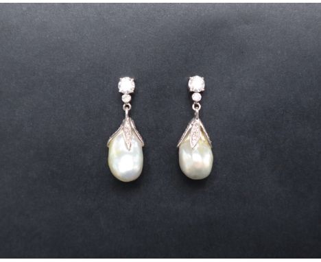 A pair of baroque pearl, diamond and paste set drop earrings