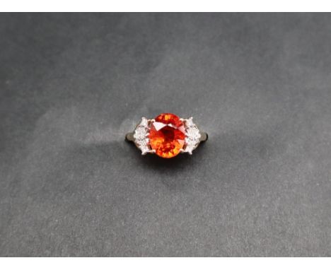 Gemporia - A 4.3ct oval Mandarin Garnet and diamond 18k gold Lorique ring, metal 3.75g, size N to O, with certificate
