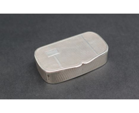 A George VI silver pill box of shaped rectangular form, with engine turned decoration, Birmingham, 1947, WS, 62mm wide, appro