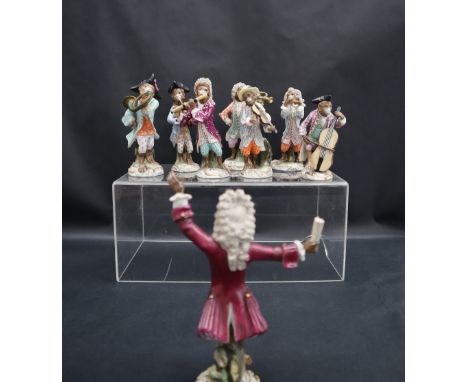 A set of eight continental Augustus Rex Monkey band Figures, including the conductor
