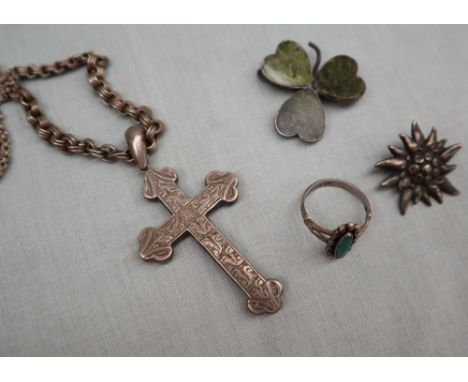 A white metal crucifix, on a white metal chain, together with a silver ring, silver shamrock brooch, another brooch and crown