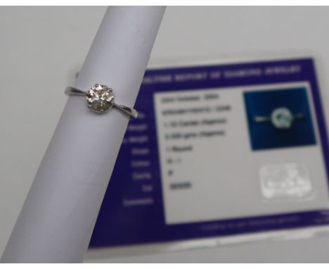 A solitaire diamond ring, the round old cut diamond approximately 1.12cts, to an 18ct white gold setting and shank, with a ce