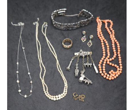 A 9ct gold seed pearl and bead set band, size L, approximately 4 grams together with a coral bead necklace, pearl necklace, s