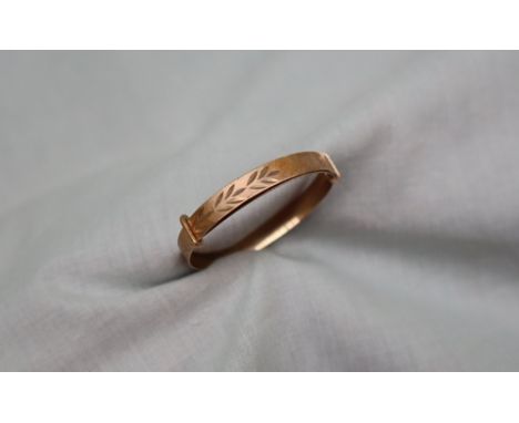 A 9ct yellow gold child's bangle, approximately 2.5 grams