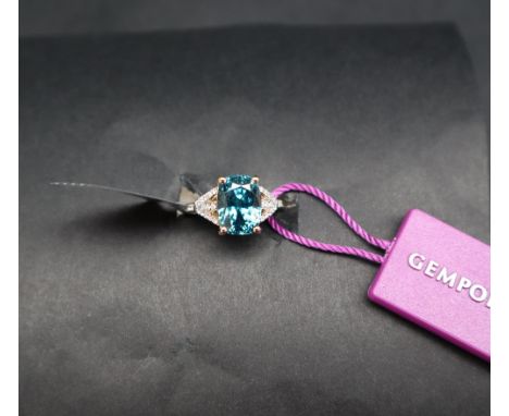 Gemporia - A Ratanakiri blue Zircon and Diamond 18k gold Lorique ring, set with a 7.840cts cushion cut Zircon and diamonds, s