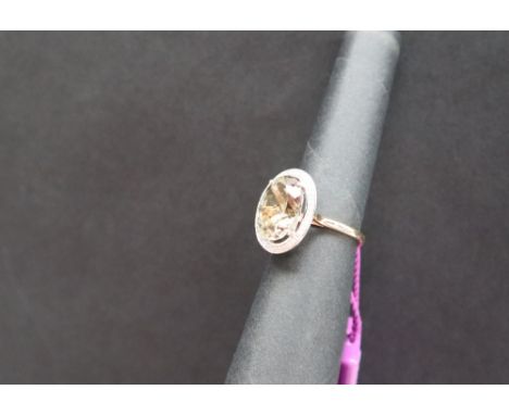 Gemporia - A 7.22ctsd Csarite and Diamond 18k two tone gold ring, size N to O, metal 4.32g with certificate
