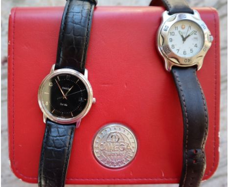 A gentleman's Omega DeVille wristwatch, with a black dial, Arabic numerals and batons with date aperture at 3, approximately 