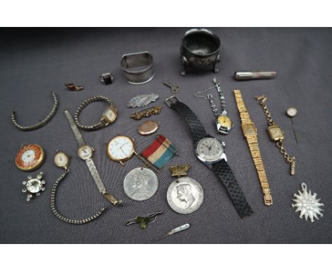 A collection of lady's wristwatches, together with a gentleman's Mihla wristwatch, silver napkin ring, costume jewellery etc