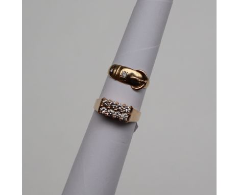 A six stone diamond ring, set with eight round brilliant cut diamonds to a yellow metal setting and shank, size O, approximat