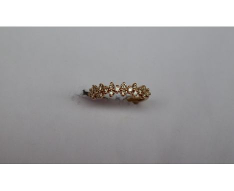 Gemporia - An 18k gold natural yellow diamond Tomas Rae ring, set with nineteen round diamonds, size N to O, metal 2.94g with