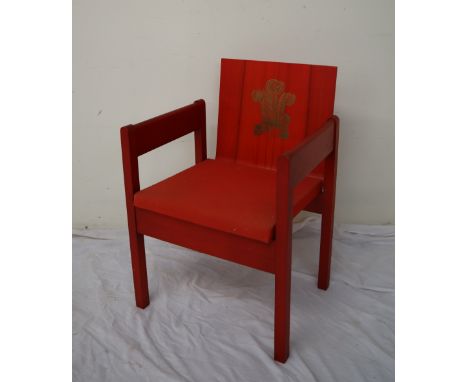 A Prince of Wales Investiture Chair, The Earl of Snowden and Carl Toms, a red painted beech and laminate elbow chair produced