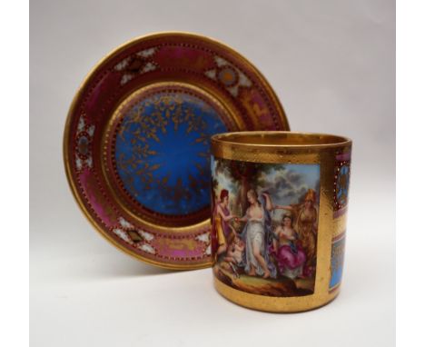 A Vienna style porcelain cabinet cup and saucer, Painted with cupid and other figures, beehive mark to the base, 8.5cm high  