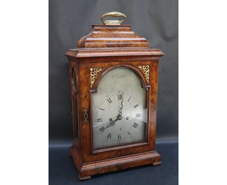 An 18th century walnut cased bracket clock, the silvered dial signed "Jullion, Brentford" with broad chapter ring and subsidi