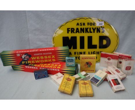 A glass advertising sign of oval form with a yellow ground printed  "Ask for Franklyn's Mild a fine light tobacco", 35cm x 24