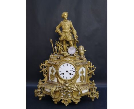 A 19th century French ormolu mantle clock, surmounted by a sea captain, with various nautical artefacts, the circular enamel 